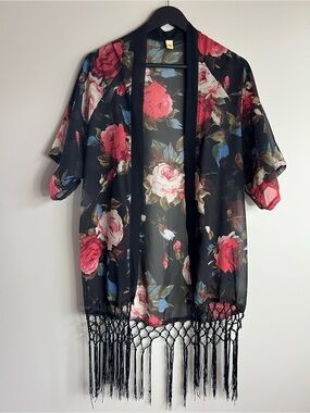 Sheer floral cardigan with tassels fits like a medium large bathing suit cover